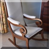 F32. Upholstered rocker. 41”h 